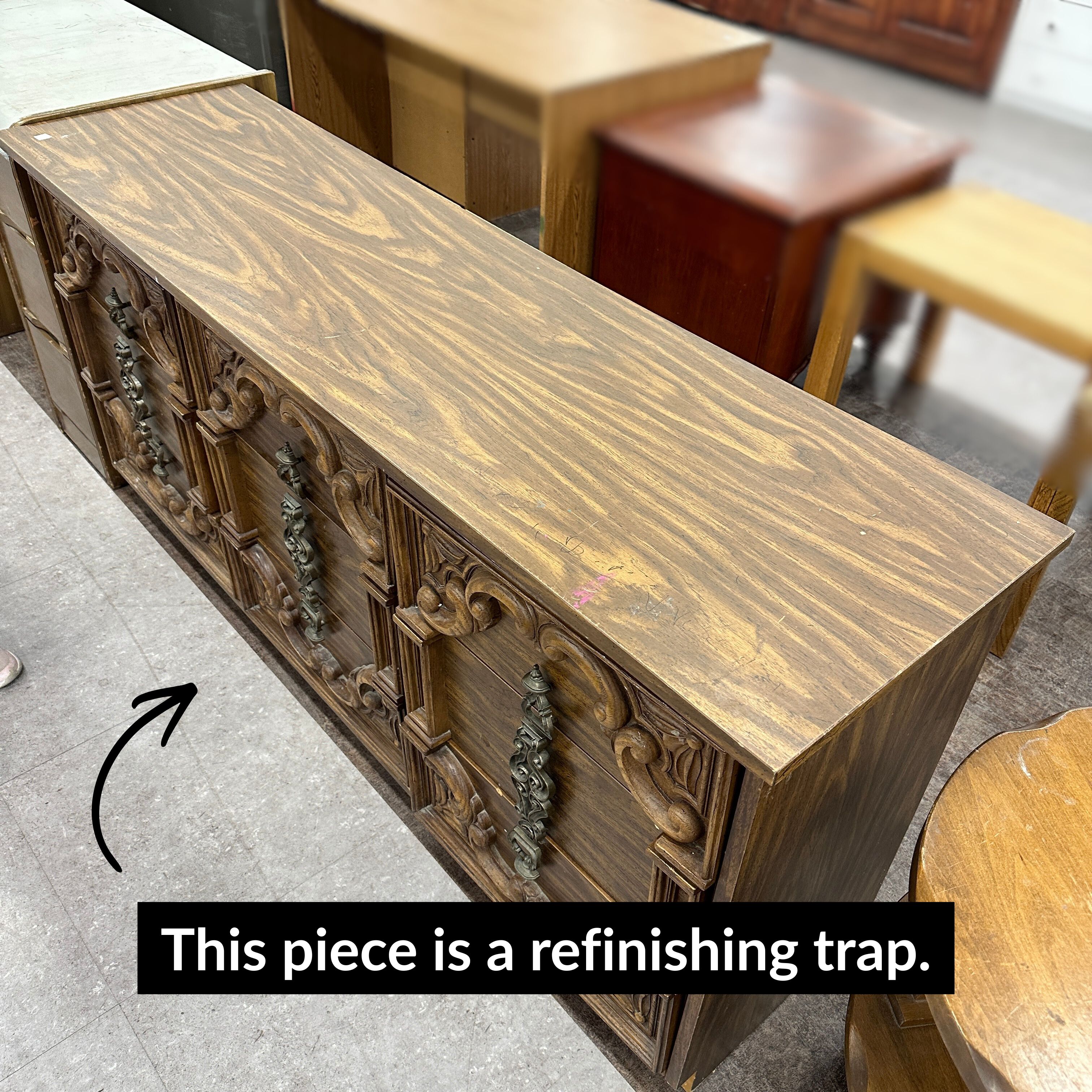 Old detailed dresser in thrift store
